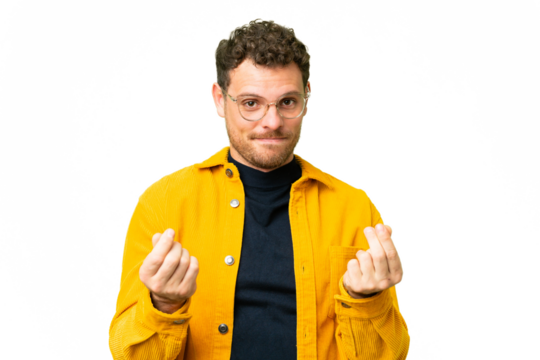 Brazilian man over isolated chroma key background making money gesture but is ruined