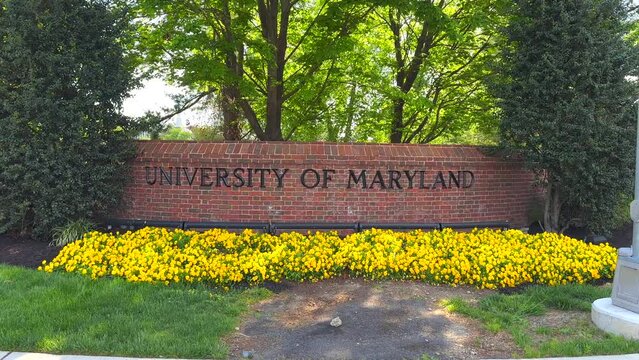 14,391 - Dolly Shot of University of Maryland Sign