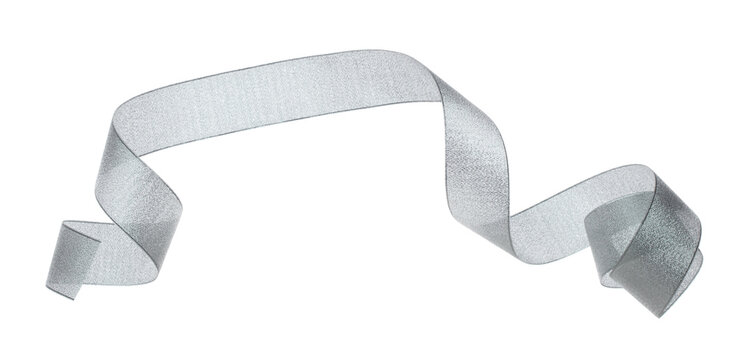 Gray ribbon long straight fly in air with curve roll shiny. Gray ribbon for present gift birthday party to wrap around decorate and make of textile cloth long straight. White background isolated