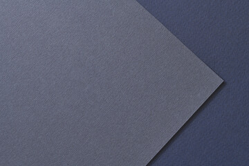 Rough kraft paper background, paper texture different shades of blue. Mockup with copy space for text.