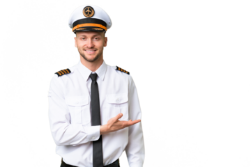 Airplane pilot man over isolated background presenting an idea while looking smiling towards