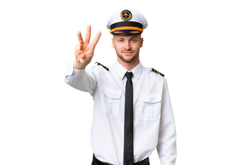 Airplane pilot man over isolated background happy and counting three with fingers
