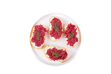 Ricotta beet salad bruschetta on a white isolated background