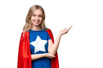 Super Hero English woman over isolated background extending hands to the side for inviting to come