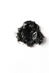 Natural clay mask swatch, black mineral treatment for skin, salon procedure and spa concept