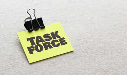 Task Force words on a small piece of paper.