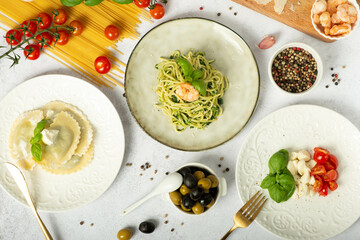 set of various plates of food isolated on a white background, top view