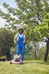 Afro-American Landscaper Expertly Navigating the Lawns with Precision