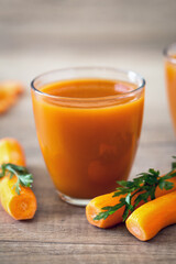 fresh glasses of carrot juice.