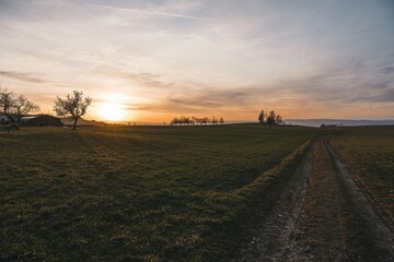Fototapeta premium sunset with a trail in foreground