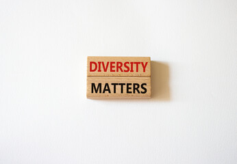 Diversity matters symbol. Wooden blocks with words Diversity matters. Beautiful white background. Business and Diversity matters concept. Copy space.