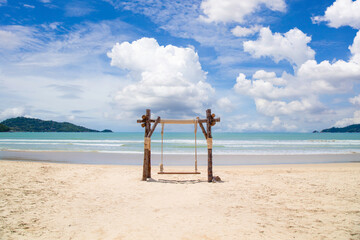 The Exotic Tropical Paradise Swings over Crystal Clear Turquoise Blue Ocean Sea Water Landscape Seascape