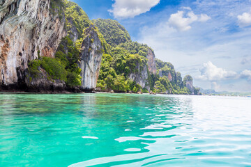 Fototapeta na wymiar The Travel vacation background - Tropical island with blue sky, Phuket, Thailand.