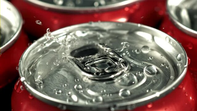 Drops of water fall on a can of cola. Filmed is slow motion 1000 fps. High quality FullHD footage