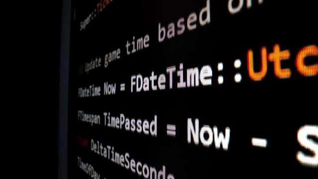 Closeup macro shot movement of coding script moving across LED screen with real-time AI-generated typing, showcasing advanced AI learning in optimization, debug and coding for software development.