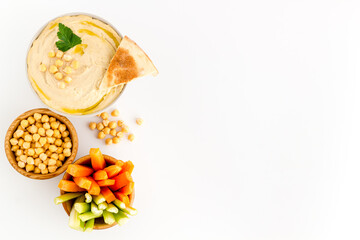 Vegetarian dish - hummus with vegetables sticks