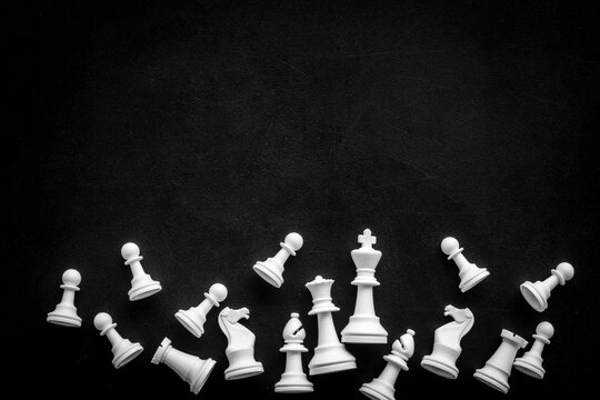 Chess pieces top view as business competition and leadership concept