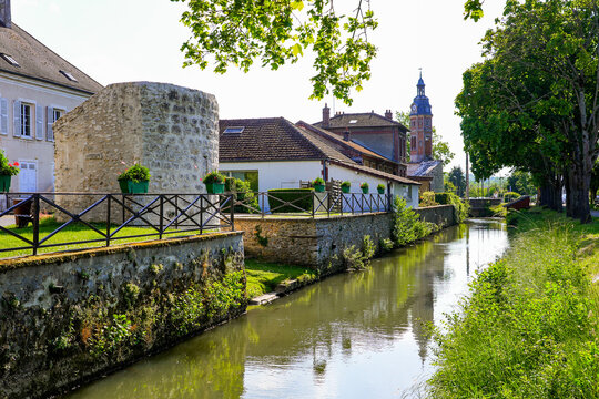 Home built next to the ruins of a medieval fortification tower by the Grand Morin river in Crécy la Chapelle, a village of Seine et Marne in Paris region (France) nicknamed "Venice of Brie"