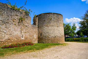 Fototapeta na wymiar Round corner tower of the medieval castle of Brie Comte Robert in the French department of Seine et Marne in the capital region of Ile-de-France near Paris