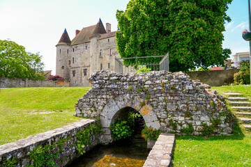 Old bridge in front of the medieval castle of Nemours in the town of the same name in the Loing...