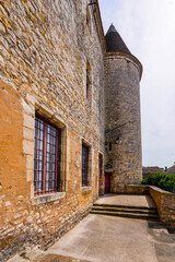 Fototapeta na wymiar Round tower of the medieval castle of Nemours in the town of the same name in the Loing valley south of Fontainebleau in the French department of Seine et Marne in Paris region
