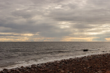 Sunset on the White Sea coast near Cape Ship. Amethyst coast.