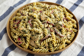 Homemade Creamy Lemon Butter Chicken Pasta on a Plate, side view.