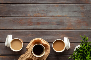Fototapeta na wymiar Coffee to go in many paper cups. Takeaway coffee