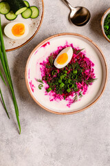 Cold summer soup of beets, kefir, cucumbers, eggs and dill.