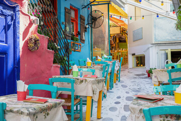 Outdoors traditional tavern restaurant, destination Greece, Tinos island Hora town Cyclades.