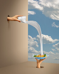 Outdoor breakfast. Female hands pouring milk into bowl with corn flakes. Concept of delicious taste, creativity, art.
