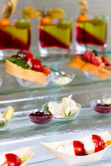 a table topped with lots of different types of food. hotel conference coffee break idea 
