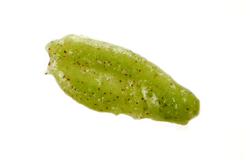 Green exfoliator swatche of white background. Close up of aloe vera skin care Scrub
