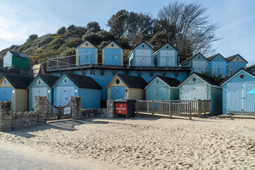 Colourful beach huts Alum Chine Beach in Bournemouth, UK.