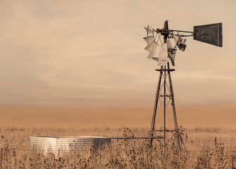 old windmill in the field © Natalia