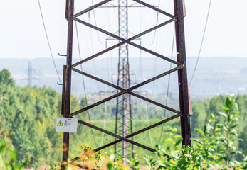 Eelectric Power Line Tower in the Forest Clearing