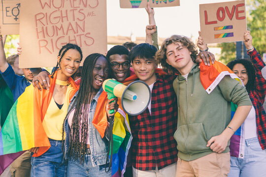young students marching in favor of the lgbt community and people's rights
