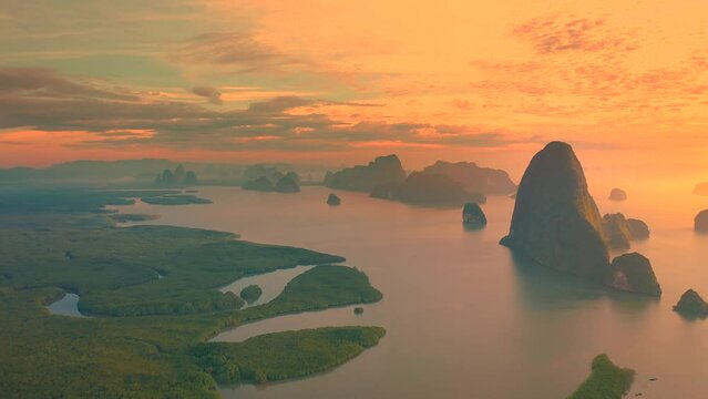 Scenic landscape with sea and mountains in Phang Nga bay at sunrise. Samet Nangshe viewpoint. Amazing wild nature of Asia. Aerial drone view 4K.