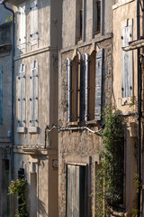 View on old streets and houses in ancient french town Arles, touristic destination with Roman ruines, Bouches-du-Rhone, France