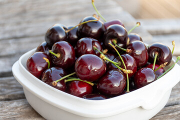 New harvest of fresh ripe dark red cherry berry in Provence, France