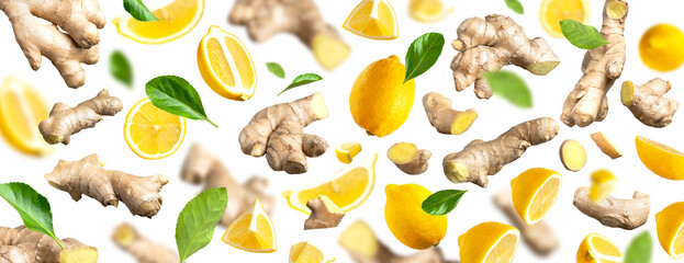 Cut out ginger. Creative food concept. Fresh ginger root, Juicy ripe yellow lemons, green leaves flying on white background. With clipping path. Natural organic ginger, Lemon slices. Pattern