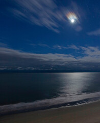 Fototapeta premium Moon that is over the water at Myrtle Beach