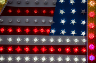Neon sign symbolizing the US flag. White red and blue light. The joy and energy of the people of the United States.
