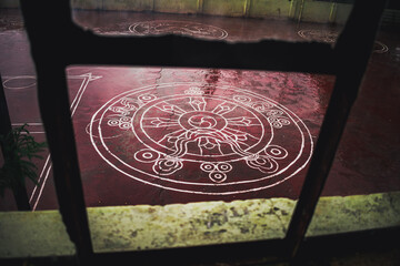 Mandala through a window on the floor of monastery at The Main Jonang Takten Phuntsok – Sanjauli...