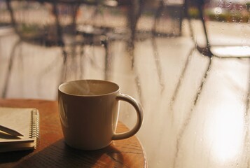 cup of coffee on a wooden table