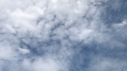 Sky blue sky cloud. there are small and large clouds alternating the sunrise is decorated with clouds in various shapes