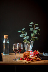 fresh strawberries and wine on kitchen