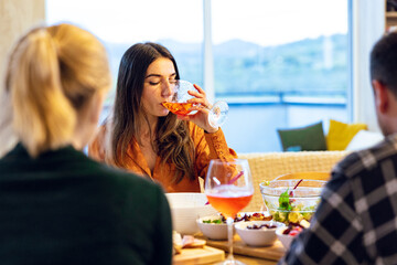 A Girl and Her Wine in the Midst of Friends.A Girl and Her Wine in the Midst of Friends".A Girl and Her Wine in the Midst of Friends".