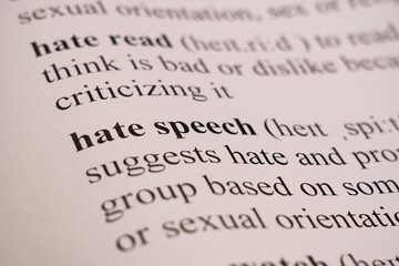 A mock up of a dictionary page with the word Hate Speech with selective focussing