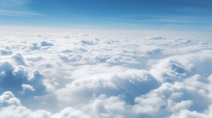 Naklejka na ściany i meble Beautiful aerial view above clouds with blue sky.Concept of Global Warming and Climate Change.
